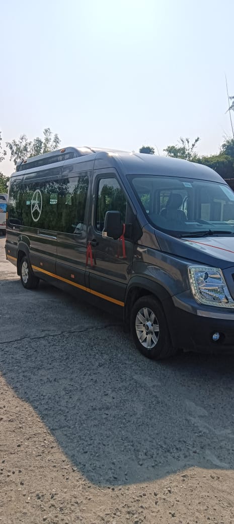 Dark grey 12 Seater Maharaja Force Urbania exterior